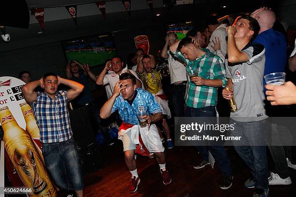 England football fans react in Riley's Sport's Bar, as England come close to equalising against Italy in their opening match of the 2014 FIFA World...
