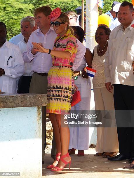 King Willem-Alexander of the Netherlands and Queen Maxima of the Netherlands stand alongside Curacao Prime Minister Ivar Asjes during a visit to the...