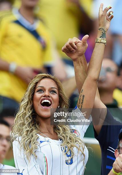 Fanny Neguesha, fiancee of Mario Balotelli of Italy, cheers in the crowd during the 2014 FIFA World Cup Brazil Group D match between England and...