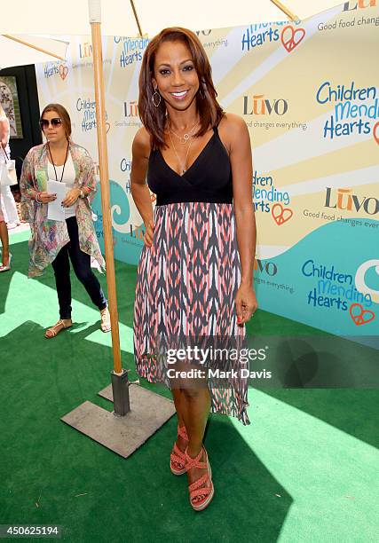 Actress Holly Robinson Peete attends the Children Mending Hearts 6th Annual Fundraiser "Empathy Rocks: A Spring Into Summer Bash" at a private...