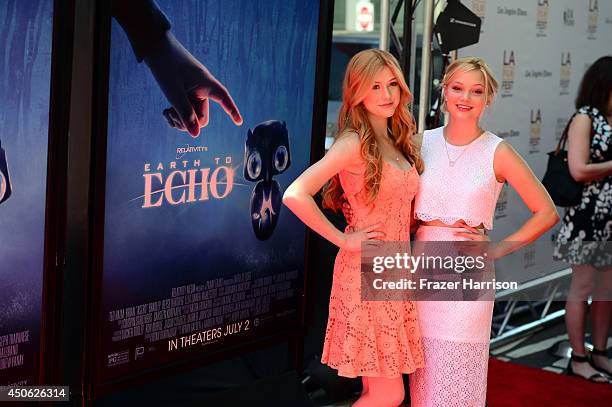 Actresses Katherine McNamara and Olivia Holt attend the premiere of "Earth to Echo" during the 2014 Los Angeles Film Festival at Premiere House on...