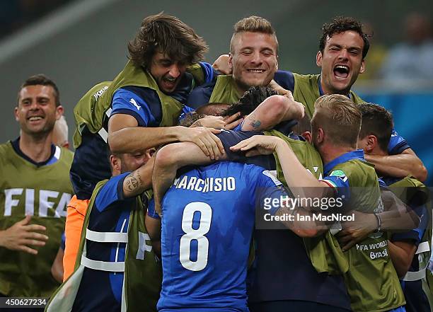 Claudio Marchisio runs to celebrate with the bench after scoring during the opening Group D match of the 2014 World Cup between England and Italy at...