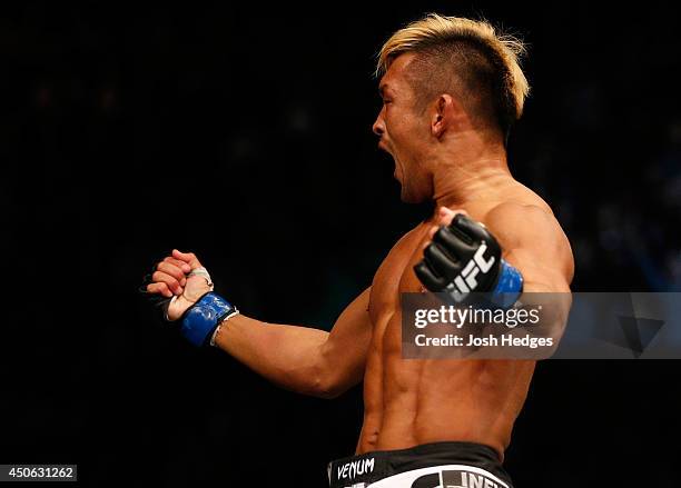 Kiichi Kunimoto reacts after his submission victory over Daniel Sarafian in their welterweight bout at Rogers Arena on June 14, 2014 in Vancouver,...