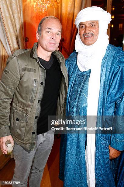 Humorist Laurent Baffie and CEO of O.N.G. 'Tidene' Mohamed Ixa attend 'Les Puits du Desert' Charity Gala at Cercle des Armees on November 19, 2013 in...