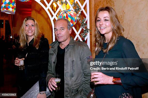 Humorist Laurent Baffie standing between Capucine Lebrun and Sophie Roussel attend 'Les Puits du Desert' Charity Gala at Cercle des Armees on...