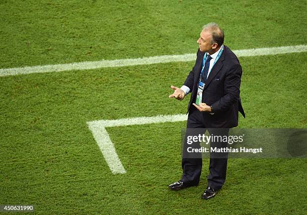 Head coach Alberto Zaccheroni of Japan looks on during the 2014 FIFA World Cup Brazil Group C match between the Ivory Coast and Japan at Arena...