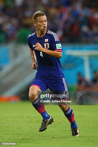 Keisuke Honda of Japan during the 2014 FIFA World Cup Brazil Group C match between the Ivory Coast and Japan at Arena Pernambuco on June 14, 2014 in...