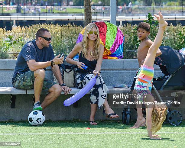 June 21: Heidi Klum and Martin Kristen with her children Leni Samuel, Henry Samuel are seen on June 21, 2013 in New York City.