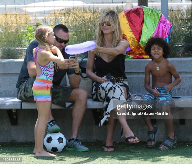 June 21: Heidi Klum and Martin Kristen with her children Leni Samuel and Johan Samuel are seen on June 21, 2013 in New York City.