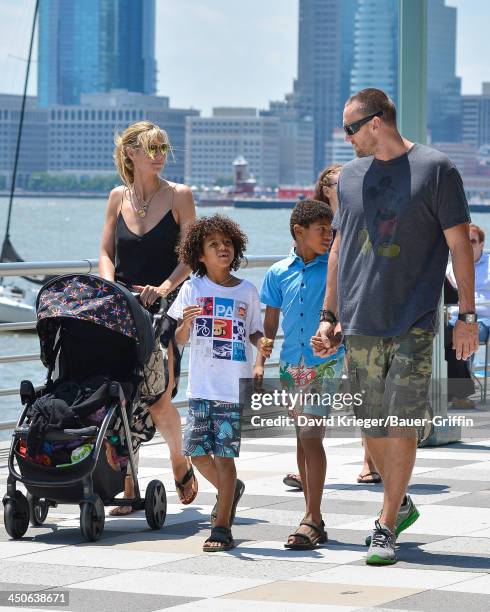 June 21: Heidi Klum and Martin Kristen with her children, Henry Samuel, Johan Samuel are seen on June 21, 2013 in New York City.