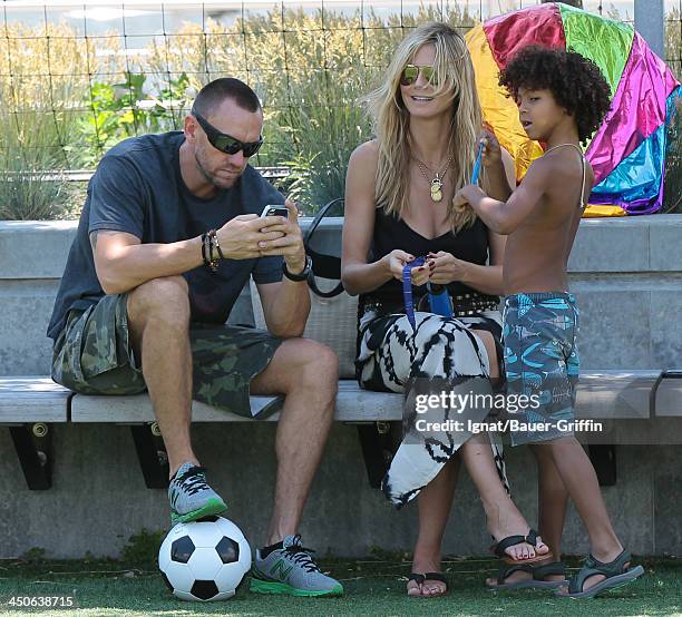 June 21: Heidi Klum and Martin Kristen with Johan Samuel are seen on June 21, 2013 in New York City.