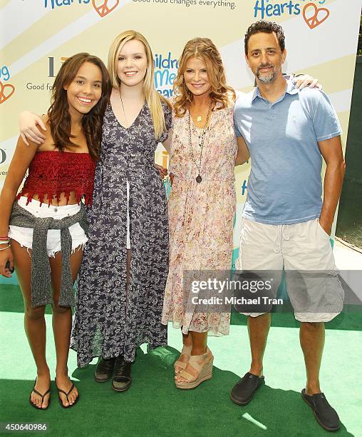 Grant Heslov with Lysa Hayland and family arrive at the Children Mending Hearts's 6th Annual Fundraiser "Empathy Rocks: A Spring Into Summer Bash"...