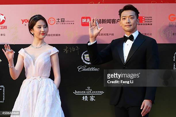 South Korea singer Rain , Chinese actress Crystal arrive for the red carpet of the 17th Shanghai International Film Festival at Shanghai Grand...