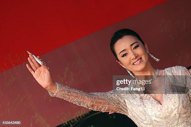 Actress Gong Li arrives for the red carpet of the 17th Shanghai International Film Festival at Shanghai Grand Theatre on June 14, 2014 in Shanghai,...