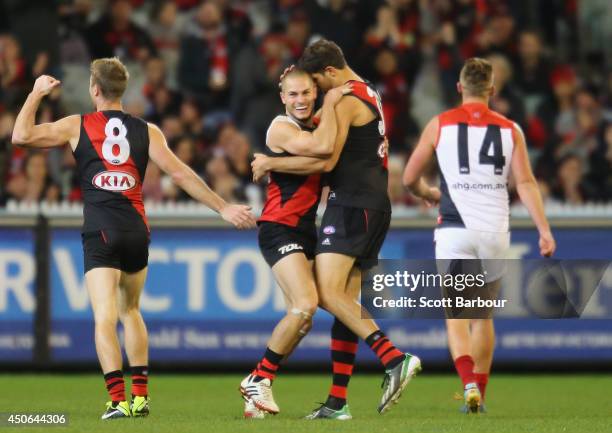 David Zaharakis of the Bombers celebrates after kicking a goal during the round 13 AFL match between the Essendon Bombers and the Melbourne Demons at...