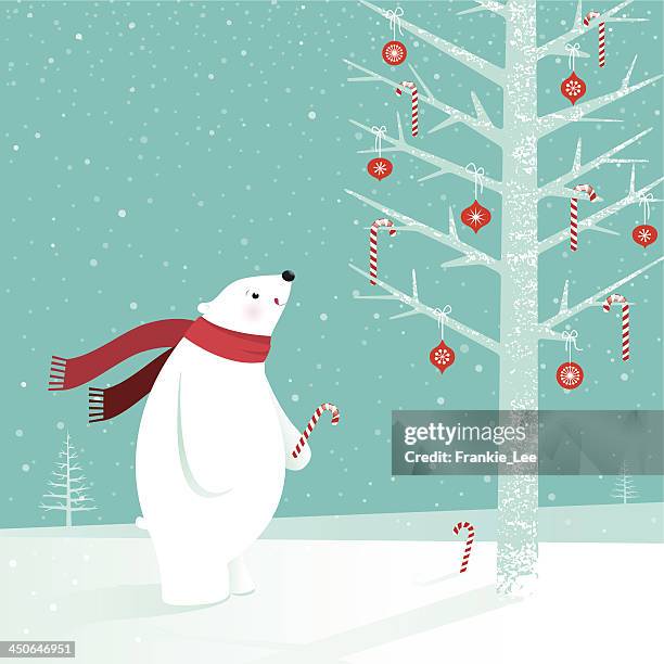 polar bear with candy cane - polar bear stock illustrations