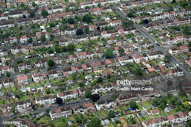 Suburban housing and streets are seen from the air on June 14, 2014 in London, England.