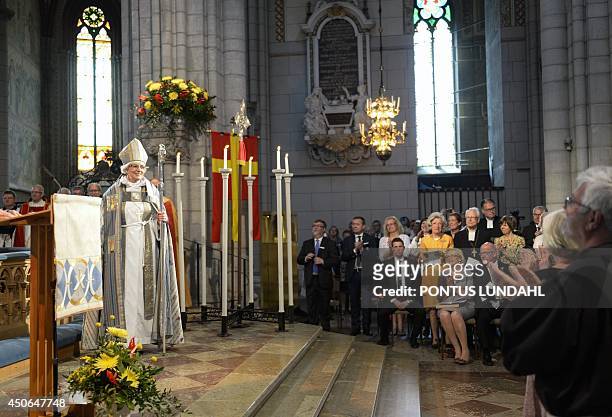New archbishop of the Church of Sweden Antje Jackelen is applauded during her installation mass at the Uppsala Cathedral, on June 15, 2014. The...