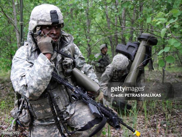 Soldier from the US Pennsylvania National Guard takes part in a field training exercise during the first phase Saber Strike 2014, at the Rukla...