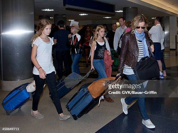 August 10: Felicity Huffman and her daughters, Georgia Grace Macy and Sofia Grace Macy, are seen on August 10, 2013 in Los Angeles, United States.