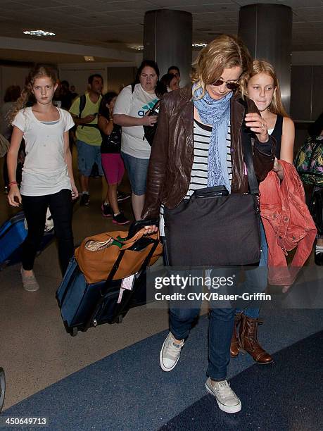 August 10: Felicity Huffman and her daughters, Georgia Grace Macy and Sofia Grace Macy, are seen on August 10, 2013 in Los Angeles, United States.