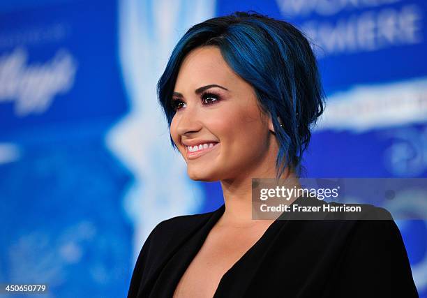 Actress Demi Lovato attends the premiere of Walt Disney Animation Studios' "Frozen"at the El Capitan Theatre on November 19, 2013 in Hollywood,...