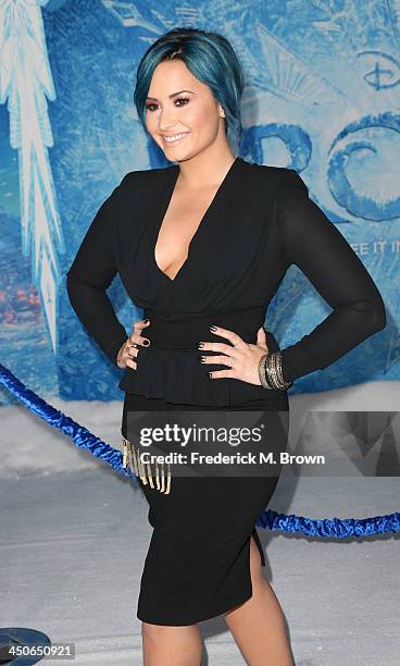 Singer Demi Lovato attends the Premiere of Walt Disney Animation Studios' "Frozen" at the El Capitan Theatre on November 19, 2013 in Hollywood,...