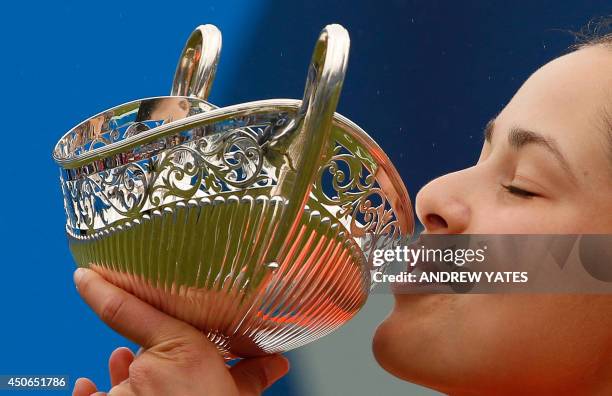 Ana Ivanovic of Serbia kisses the Maud Watson trophy after beating Barbora Zahlavova Strycova of Czech Republic in the final of the WTA AEGON Classic...