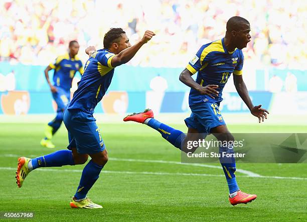 Enner Valencia of Ecuador celebrates scoring his team's first goal with Jefferson Montero during the 2014 FIFA World Cup Brazil Group E match between...