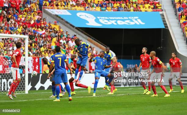 Enner Valencia of Ecuador scores the first goal during the 2014 FIFA World Cup Brazil Group E match between Switzerland and Ecuador at Estadio...
