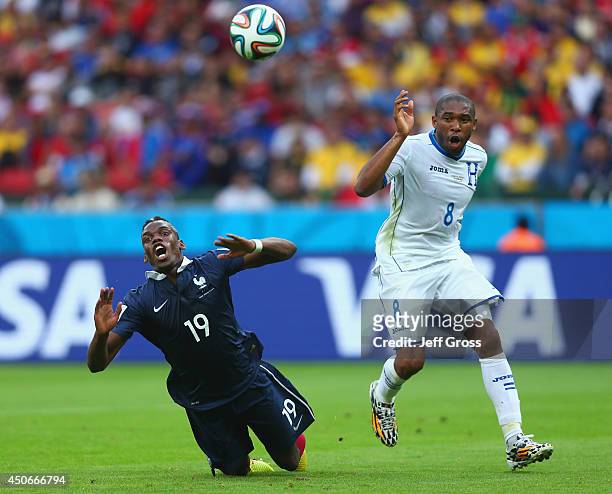 Wilson Palacios of Honduras fouls Paul Pogba of France resulting in a penalty kick during the 2014 FIFA World Cup Brazil Group E match between France...