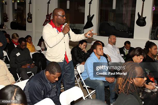 Student asks a question at Business, Beats and Inspiration: Bands & Brands at The Gibson Guitar Center on November 19, 2013 in Washington, DC.