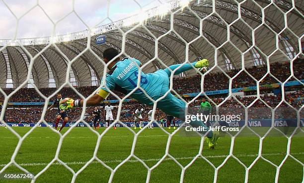 Karim Benzema of France shoots and scores his team's first goal on a penalty kick past Noel Valladares of Honduras during the 2014 FIFA World Cup...