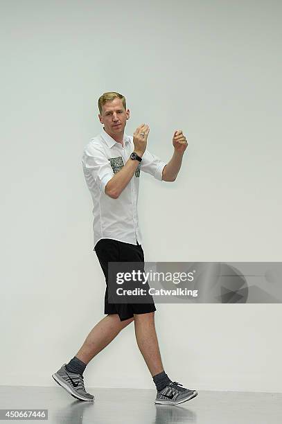 Fashion designer Christopher Raeburn walks the runway at the Christopher Raeburn Spring Summer 2015 fashion show during London Menswear Fashion Week...