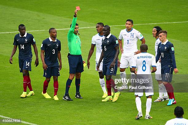 Wilson Palacios of Honduras is shown a red card by referee Sandro Ricci during the 2014 FIFA World Cup Brazil Group E match between France and...