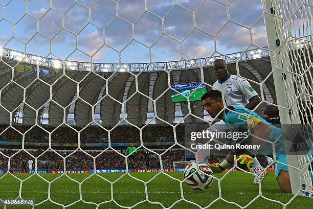 Goalkeeper Noel Valladares of Honduras scores an own goal, France's second, as he fumbles the ball over the line during the 2014 FIFA World Cup...