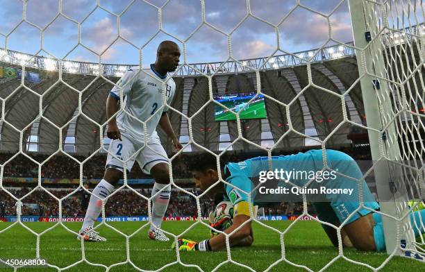Goalkeeper Noel Valladares of Honduras scores an own goal, France's second, as he fumbles the ball over the line during the 2014 FIFA World Cup...