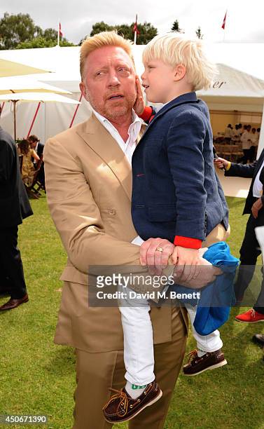 Boris Becker and Son Amadeus attends the Cartier Queen's Cup Final at Guards Polo Club on June 15, 2014 in Egham, England.