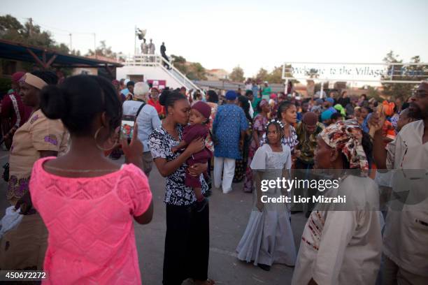 Members of the Black Hebrews community are seen during the celebration of Shavuot harvest festival on June 15, 2014 in Dimona, Israel. The community,...
