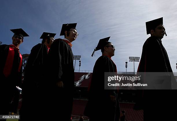 Graduating Stanford University students partcipate in the "Wacky Walk" before the start of the 123rd Stanford commencement ceremony June 15, 2014 in...