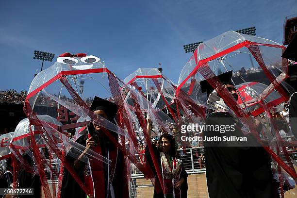 Graduating Stanford University students partcipate in the "Wacky Walk" before the start of the 123rd Stanford commencement ceremony June 15, 2014 in...