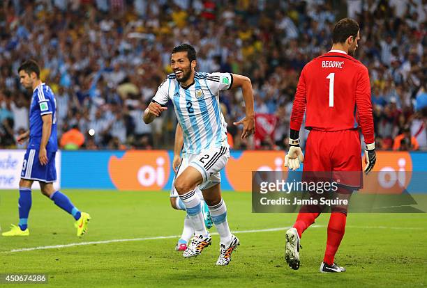 Ezequiel Garay of Argentina celebrates his team's first goal during the 2014 FIFA World Cup Brazil Group F match between Argentina and...