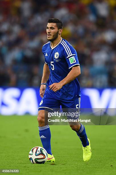 Sead Kolasinac of Bosnia and Herzegovina controls the ball during the 2014 FIFA World Cup Brazil Group F match between Argentina and...