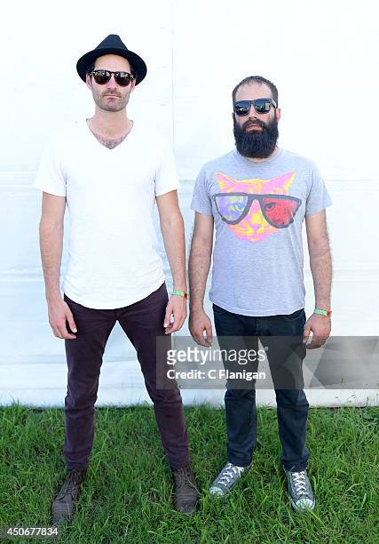 Ryan Merchant and Sebu Simonian of Capital Cities pose backstage during the 2014 Bonnaroo Music & Arts Festival on June 15, 2014 in Manchester,...