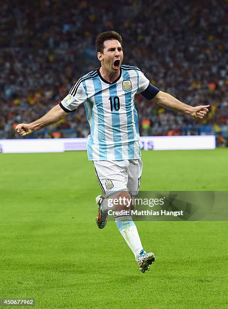 Lionel Messi of Argentina reacts after scoring his team's second goal during the 2014 FIFA World Cup Brazil Group F match between Argentina and...