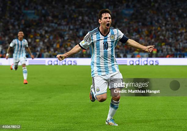 Lionel Messi of Argentina reacts after scoring his team's second goal during the 2014 FIFA World Cup Brazil Group F match between Argentina and...