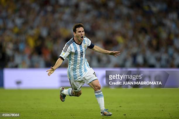 Argentina's forward and captain Lionel Messi celebrates after scoring his team's second goal during the Group F football match between Argentina and...
