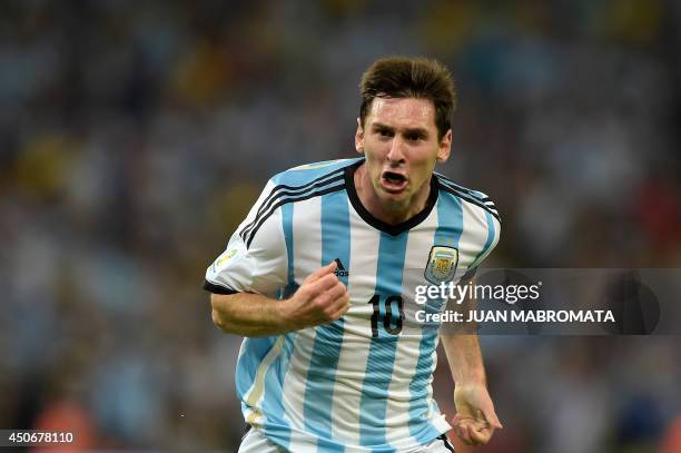 Argentina's forward and captain Lionel Messi celebrates after scoring his team's second goal during the Group F football match between Argentina and...