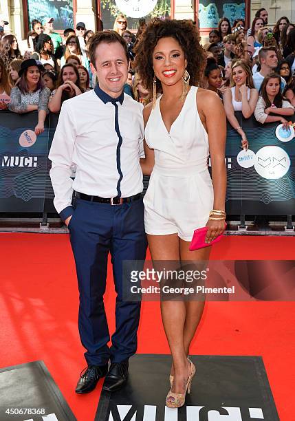 S Paul Lemieux and Aisha Alfa arrive at the 2014 MuchMusic Video Awards at MuchMusic HQ on June 15, 2014 in Toronto, Canada.