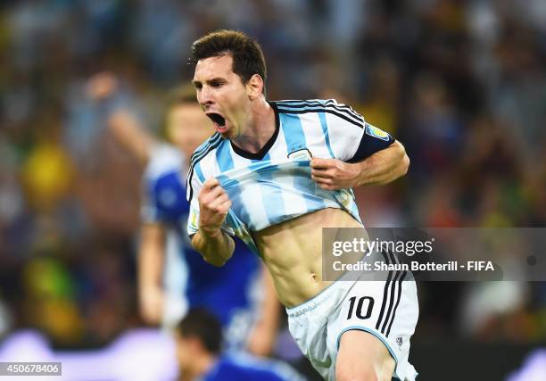 Lionel Messi of Argentina celebrates after scoring the team's second goal during the 2014 FIFA World Cup Brazil Group F match between Argentina and...